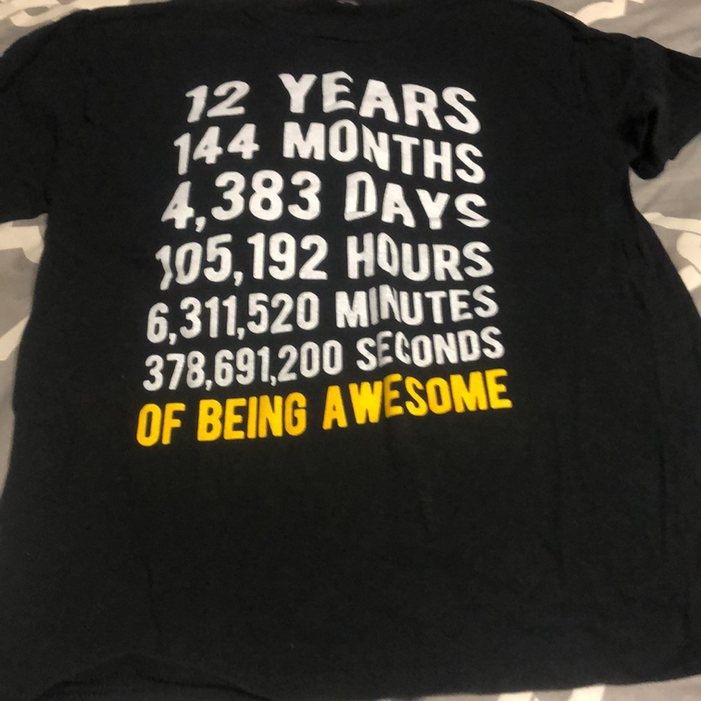 Youth 12 years old tee size medium